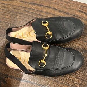 Gucci Black Leather Mules with Gold Accents